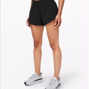 Lululemon black tracker short size 4